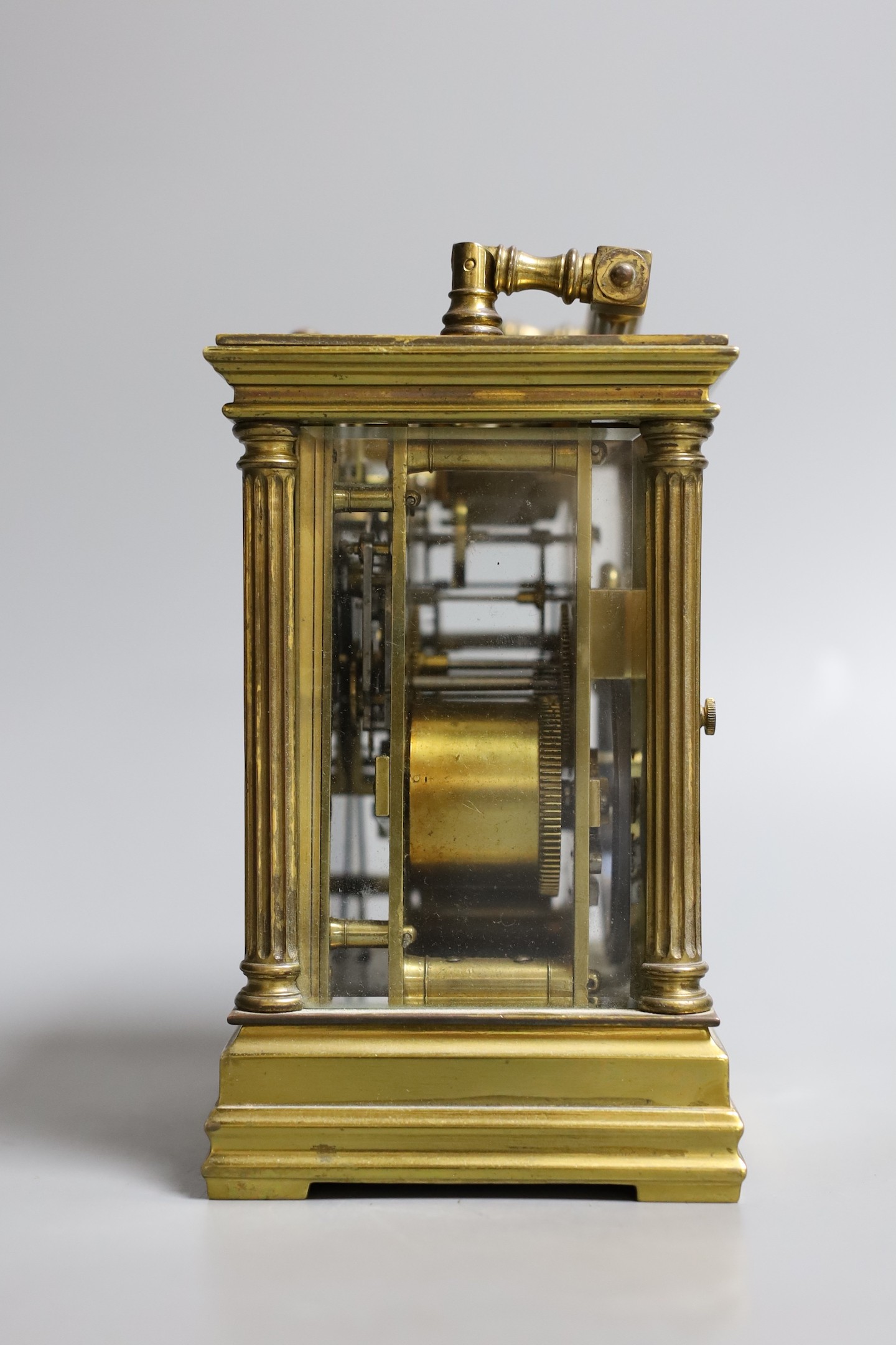 A French quarter repeating gilt brass carriage clock, 14 cms high